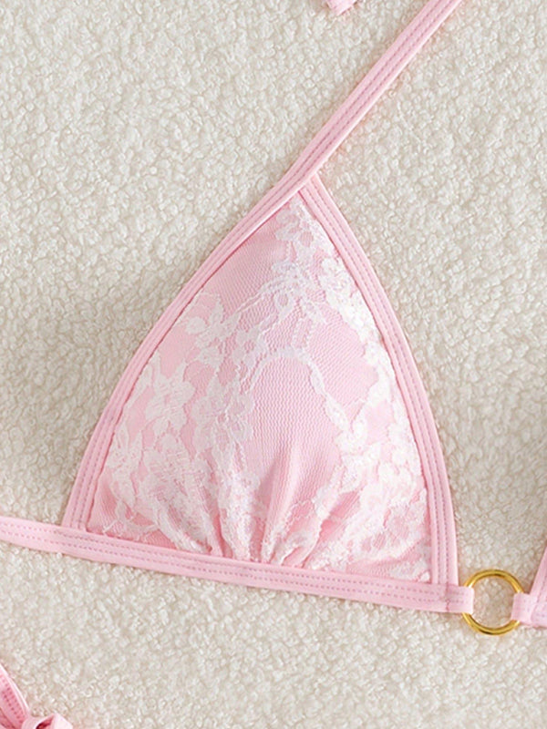 Backless white lace and pink bikini